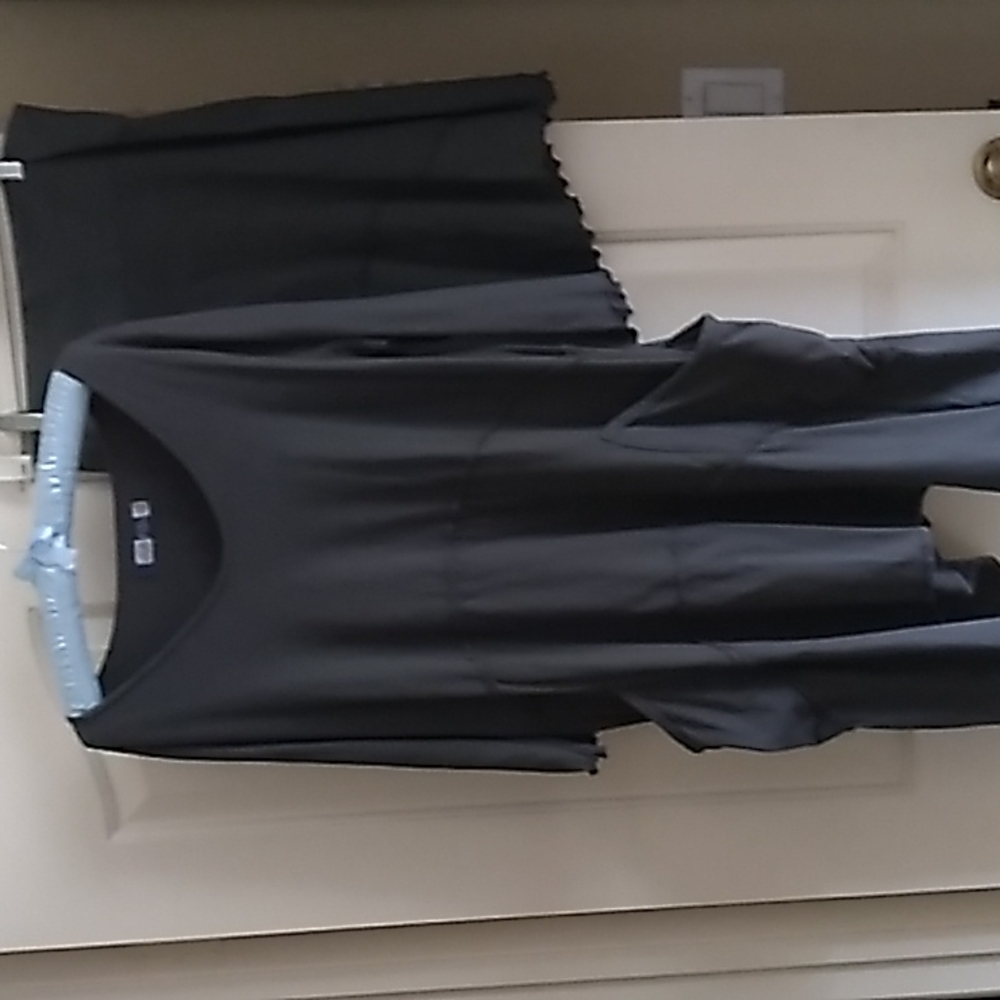 Two piece Blue Fish dark gray unpainted asymmetrical top and skirt.